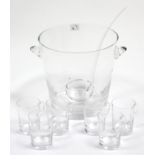 A glass two-handled punch bowl of round tapered form, 9 ¾” high, complete with ladle & a set of