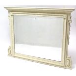 An antique white painted wooden frame overmantel mirror, with egg-&-dart frieze, beaded edge, &