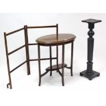 An Edwardian inlaid-mahogany oval two-tier occasional table on square legs, 26½” wide; together with