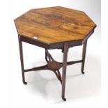 A 19th century inlaid rosewood octagonal centre table on square tapered legs & ceramic castors, with