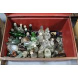 A collection of approximately eighty various bottles & jars; & a grained tin travelling trunk, 27”