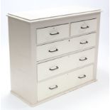A white painted pine chest, fitted two short & three long graduated drawers with brass handle, 41”