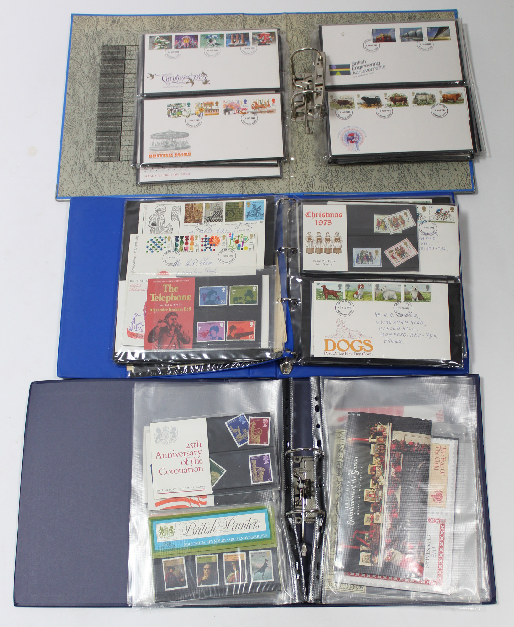 A collection of approximately one hundred various first-day covers, contained in three albums.