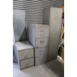 A grey art-metal locker enclosed by door,18” wide x 71½” high; a grey art-metal four-drawer filing