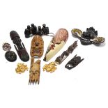 Two pairs of binoculars; & various ethnic carved wooden ornaments.