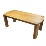 A teak dining table with rectangular top, & on square legs, 80” x 38”.