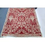 A Casa-Pupo crimson & cream rug/throw, 88” x 95”; & a Persian pattern carpet of brown & cream