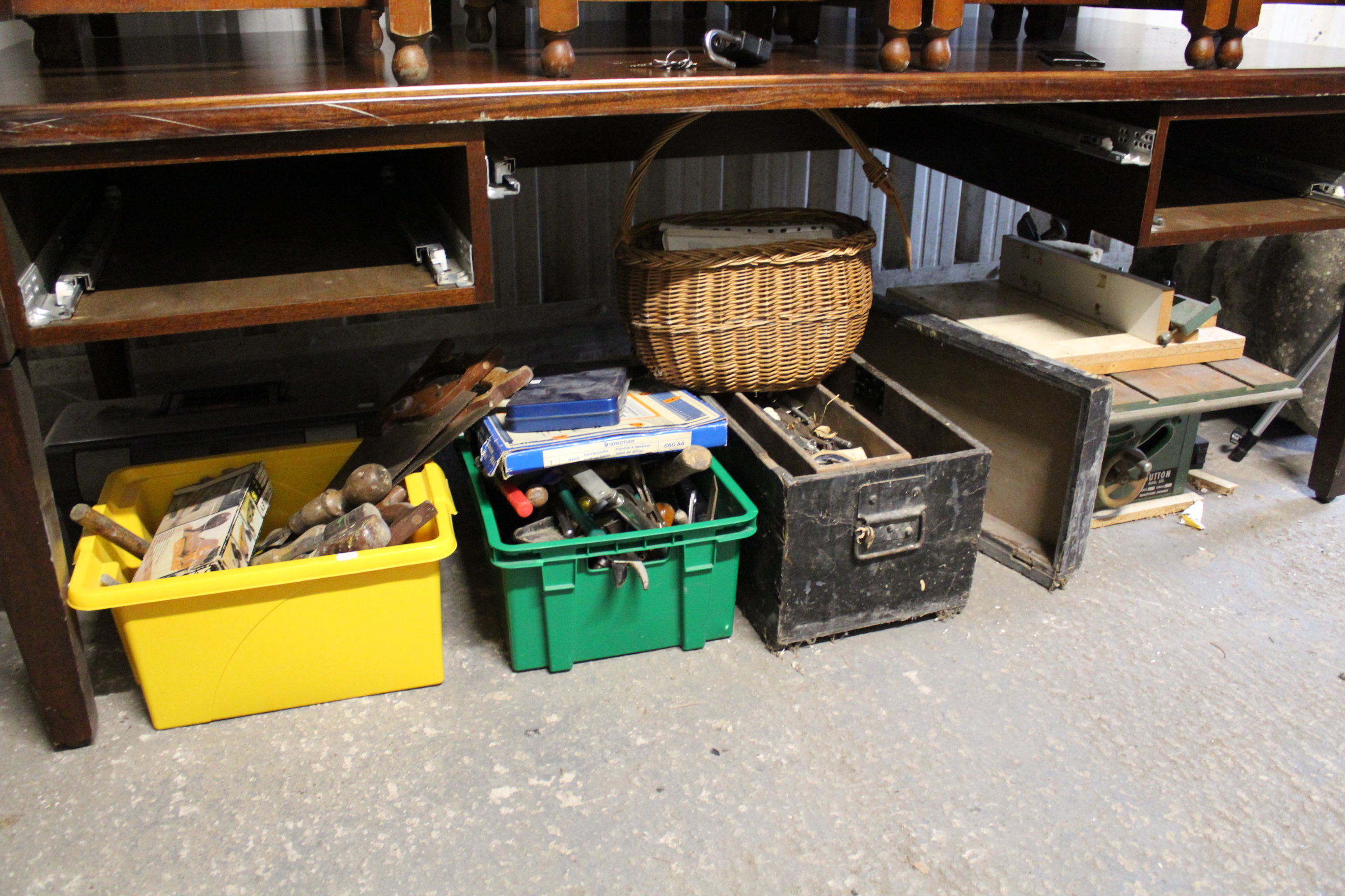 Various hand tools including two carpenter’s planes, a painted deal tool chest, etc.