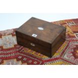 A 19th century rosewood needlework box, 11¾” wide; & a Persian pattern rug, 38” x 33”.