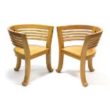 A pair of hardwood tub-shaped chairs with hard seats, & on three shaped legs; & a rectangular
