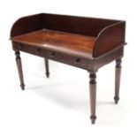 A VICTORIAN MAHOGANY TRAY-TOP WASHSTAND, fitted two mock frieze drawers, & on turned tapered legs,