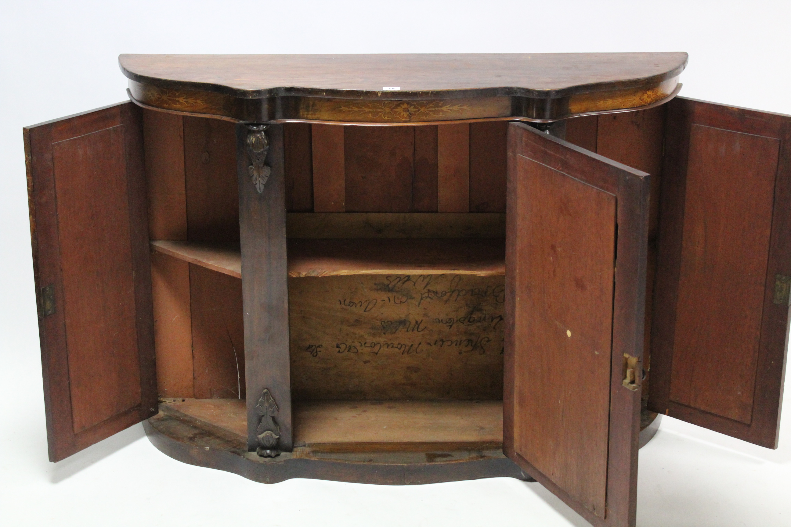 A 19th century marquetry-inlaid serpentine-front cabinet enclosed by three mirror doors, & on shaped - Image 2 of 2