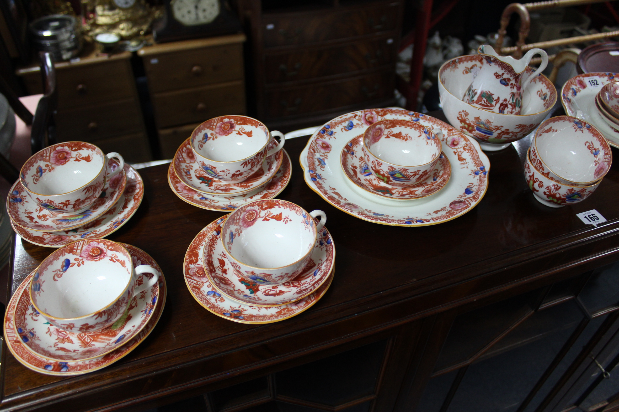 A Victorian china thirty-six piece part tea service with oriental village scene decoration. - Image 2 of 3