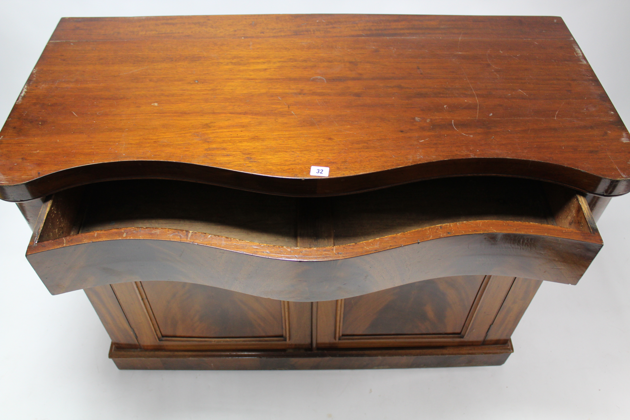 A 19th century mahogany serpentine-front chiffonier, fitted frieze drawer above cupboard enclosed by - Image 4 of 5