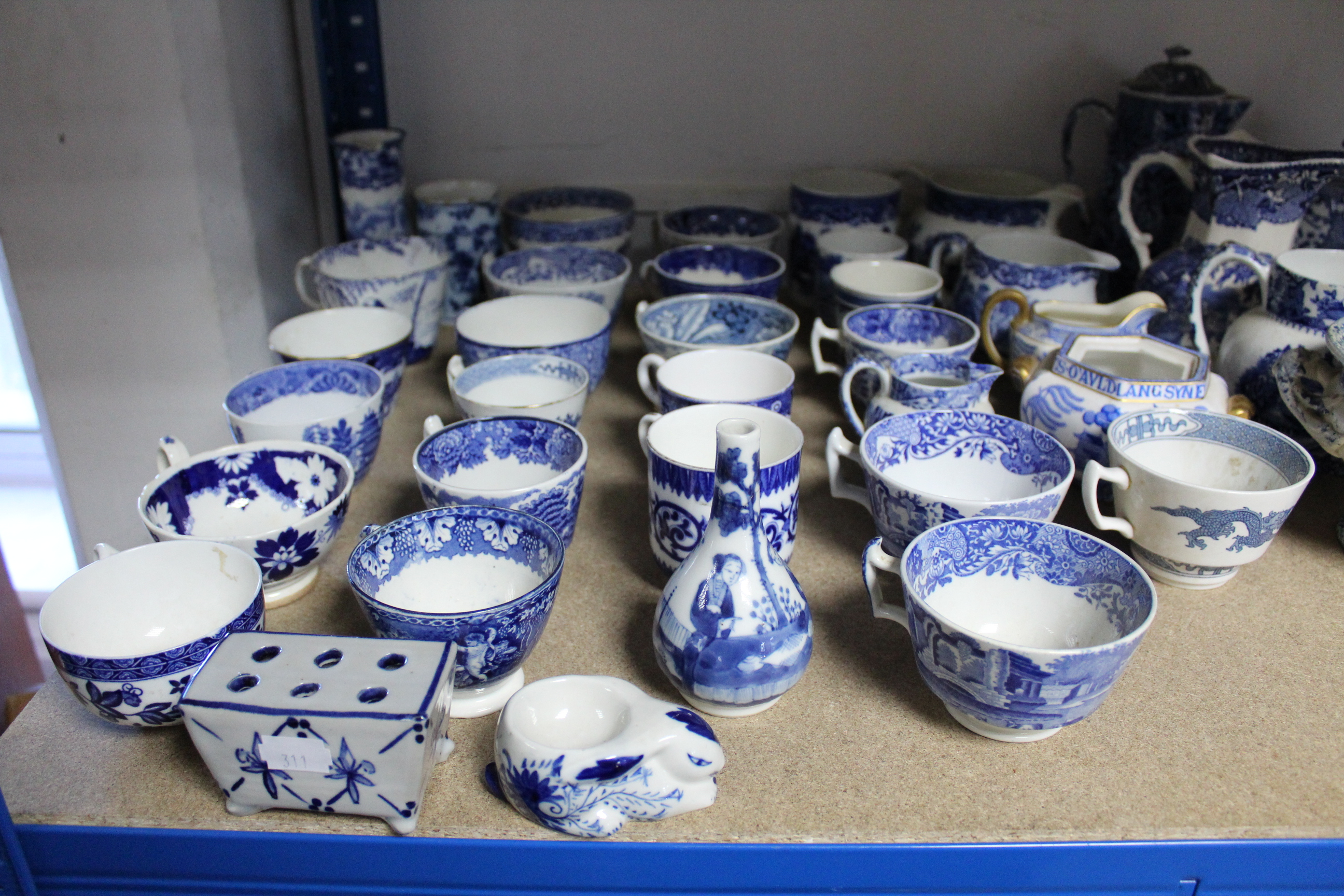 Various items of decorative blue & white china; & a pair of gilt composite wall brackets.