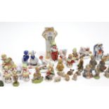Approximately twenty various china figure ornaments.