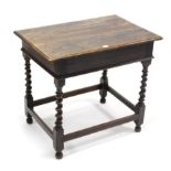 A 1930’s oak occasional table with moulded edge to the rectangular top, & on barley-twist legs &