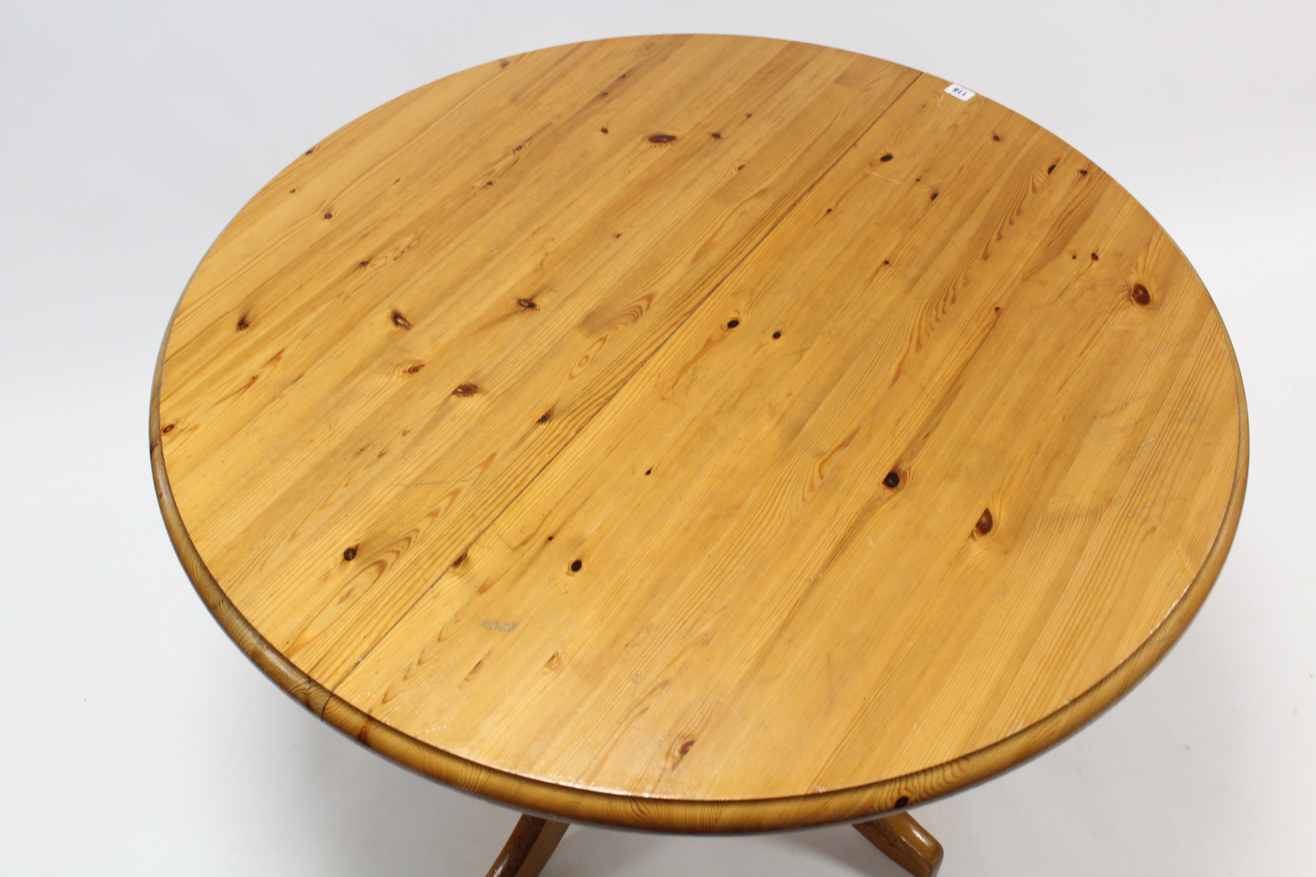 A pine pedestal dining table with circular top, & on vase-turned centre column & four splay legs, - Image 2 of 3