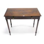 A 19th century mahogany side table, fitted frieze drawer with brass knob handles, & on turned
