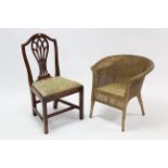 A Lloyd Loom gold painted basket chair; together with a splat-back dining chair; & a wicker coffee