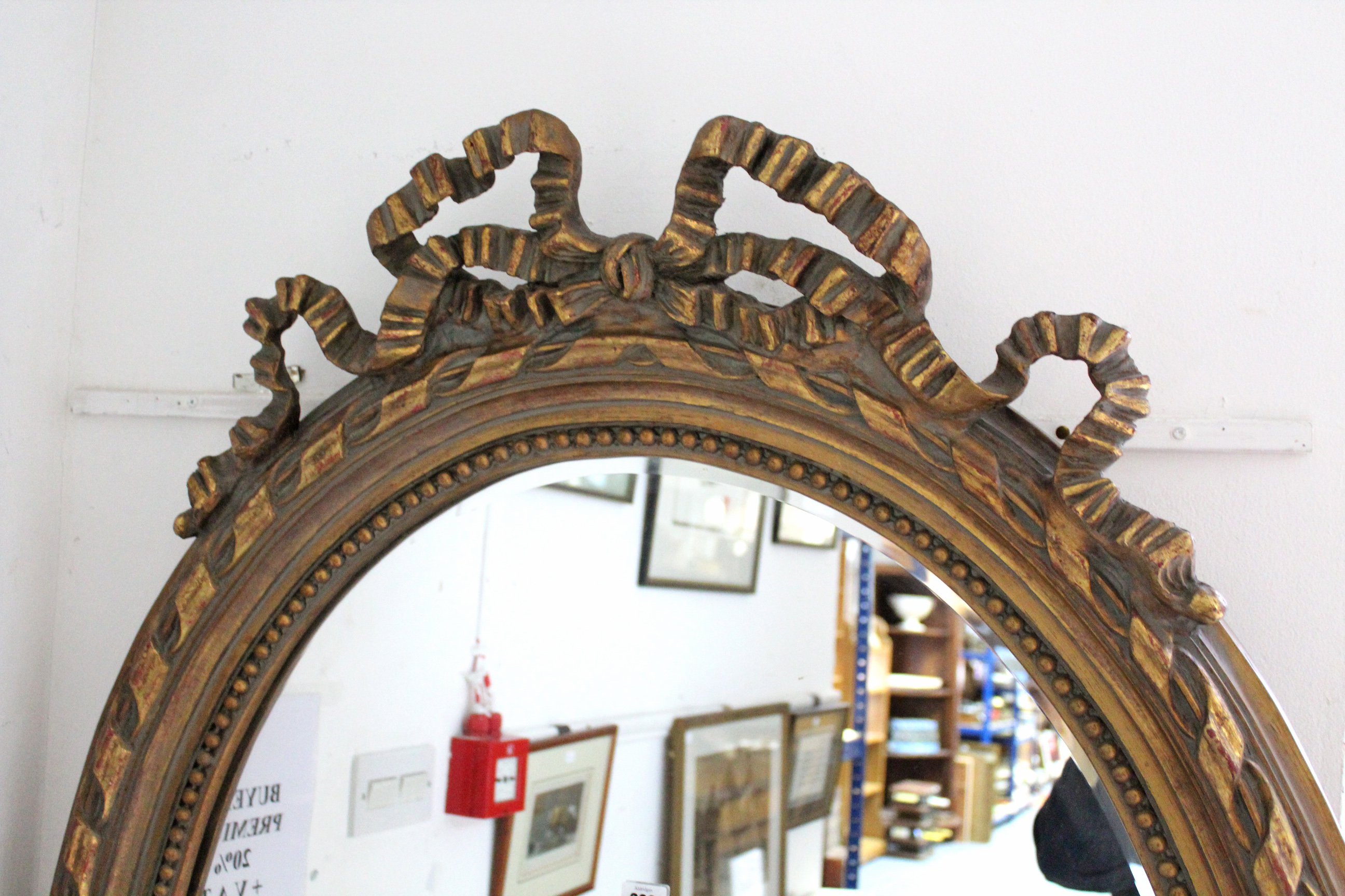 A reproduction large gilt frame oval wall mirror with ribbon-bow surmount & with beaded edge, 51” - Image 3 of 4