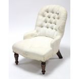 A late Victorian child’s buttoned occasional chair, on turned legs.