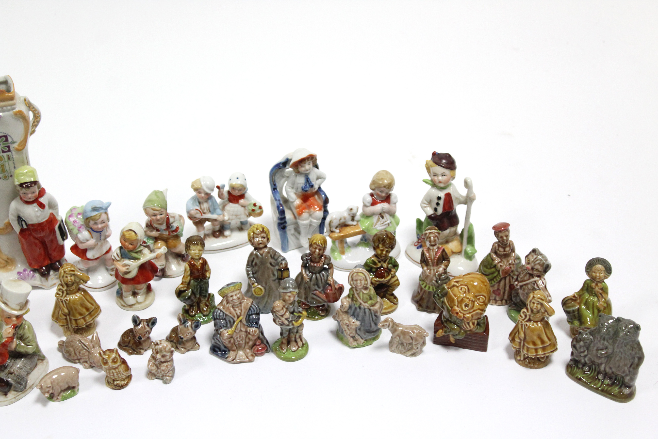 Approximately twenty various china figure ornaments. - Image 3 of 4