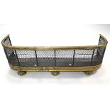 A late 19th century brass fender with mesh front, 39” long; together with various items of