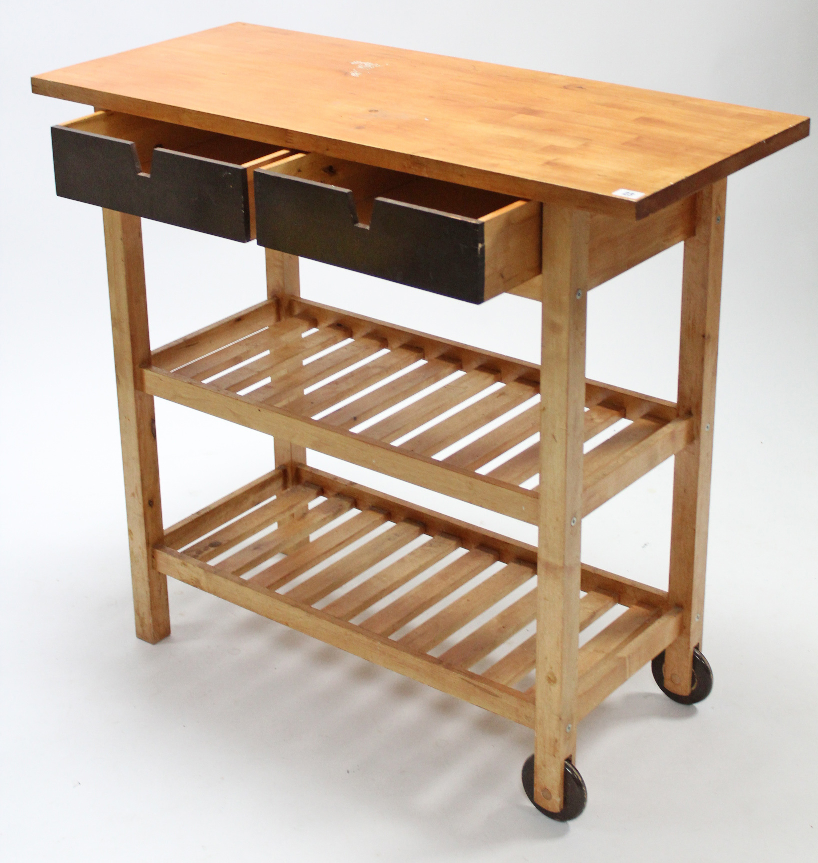 A beech kitchen island, fitted two frieze drawers above two open shelves & on square supports,