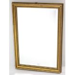 A set of three gilt frame rectangular wall mirrors, each inset bevelled plate, 29½” x 20½”; & a