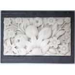 An early 19th century white marble plaque with deeply-carved decoration of flowers & fruit; 8” x