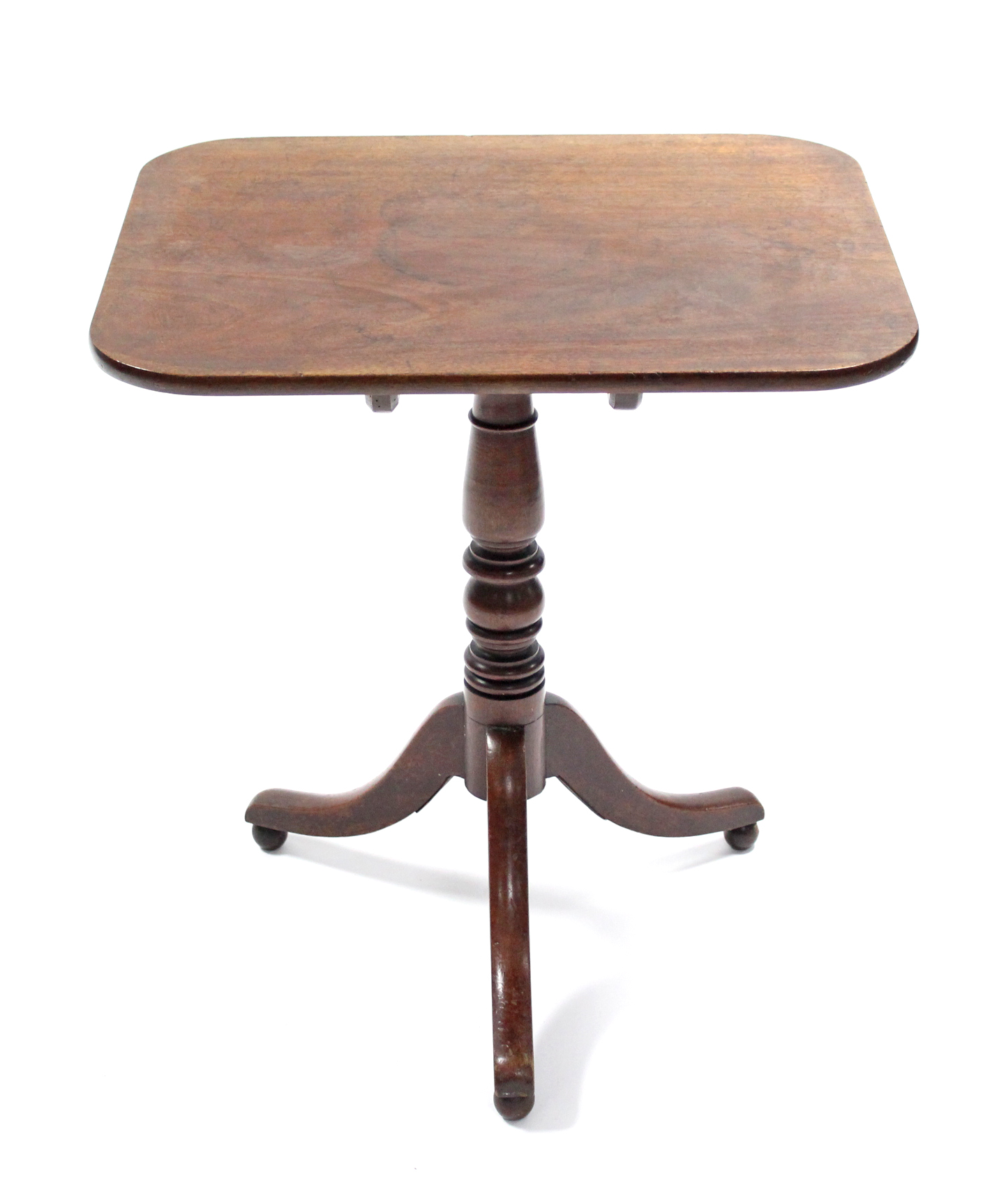 A 19th century mahogany tripod table, the rectangular tilt-top with rounded corners & on ring-turned