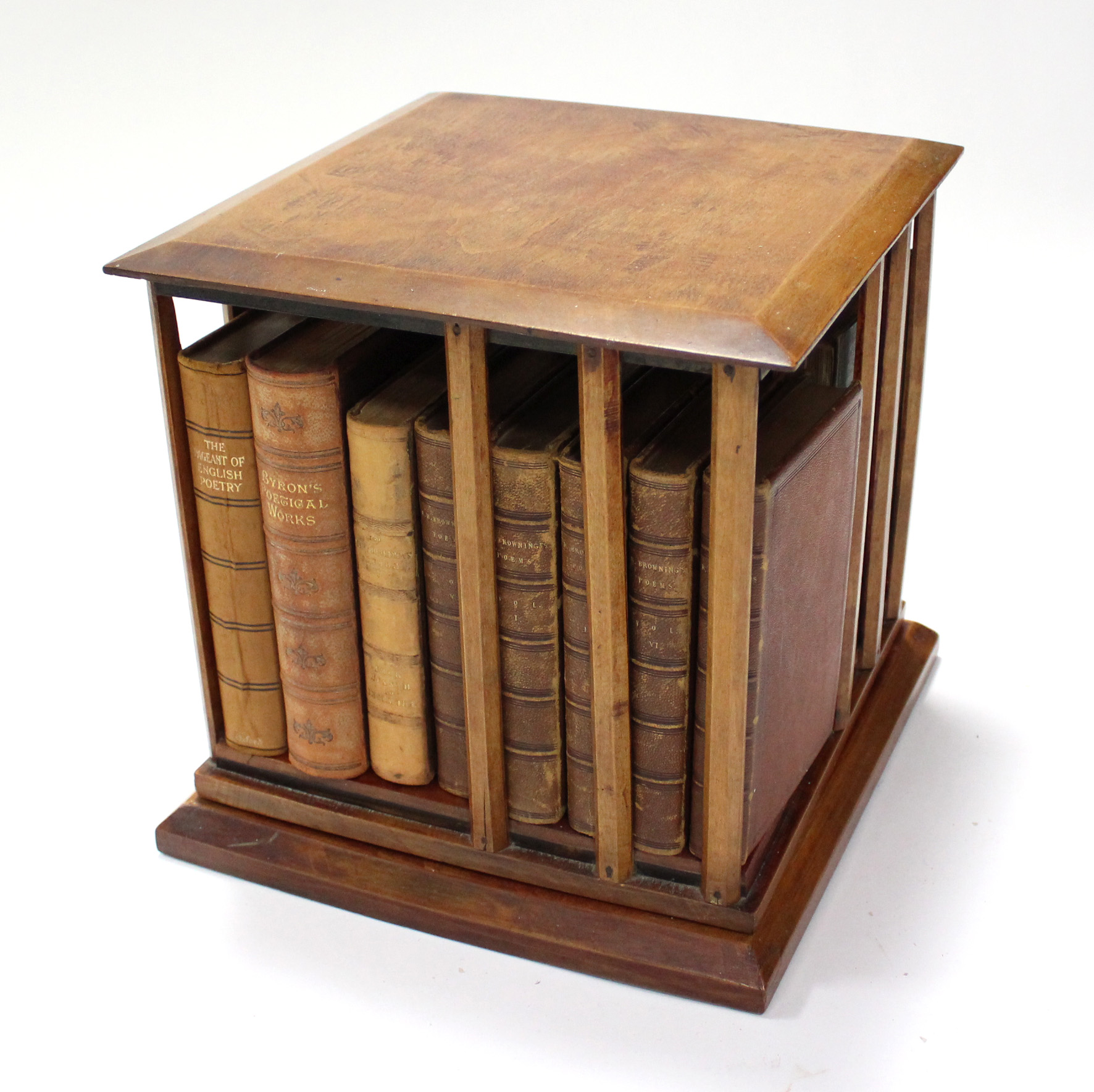 A late 19th/early 20th century beech table-top square revolving open bookcase, 11” wide x 11”