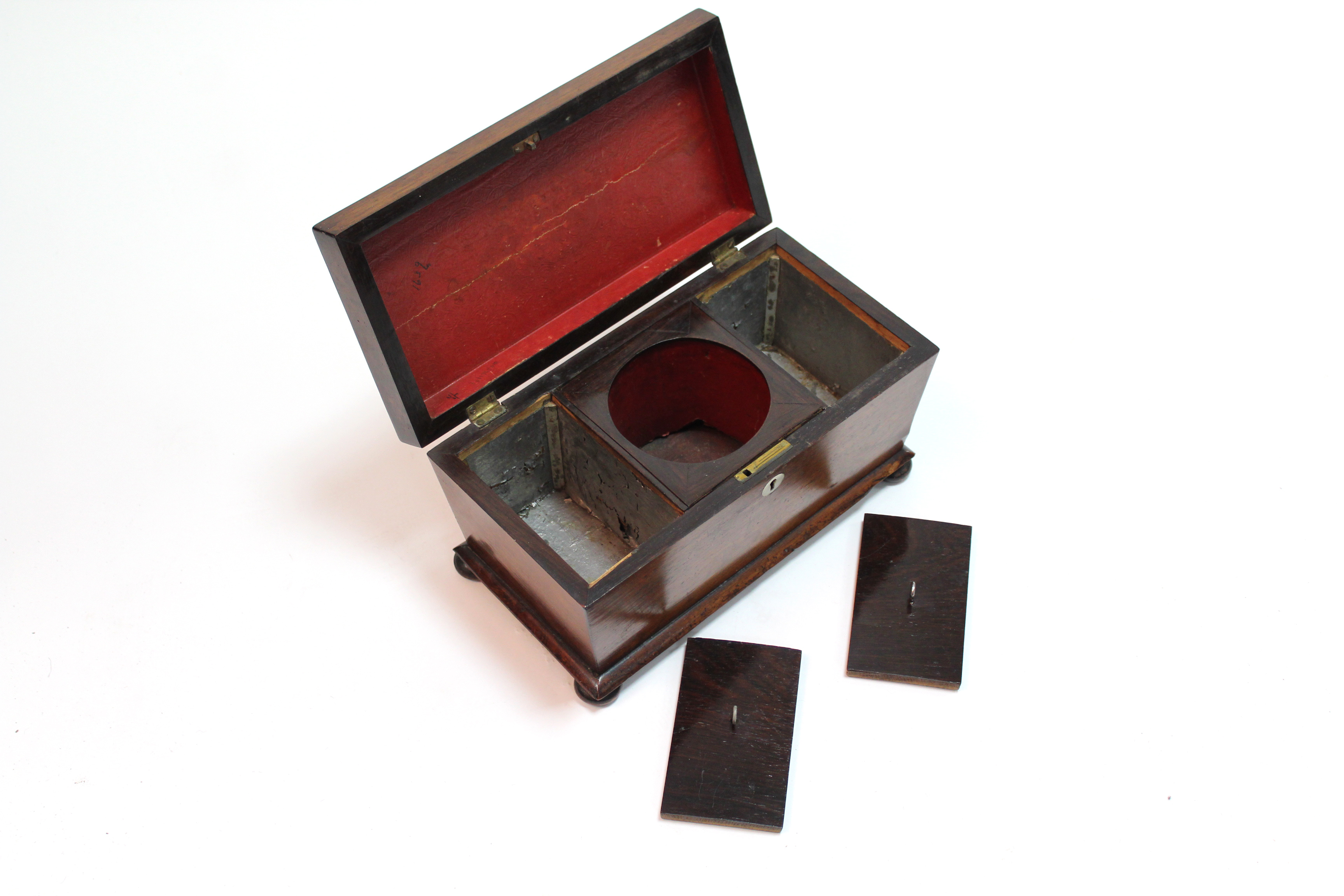 A 19th century rosewood tea caddy of rectangular form, with tapered sides & rounded top, on bun - Image 4 of 4