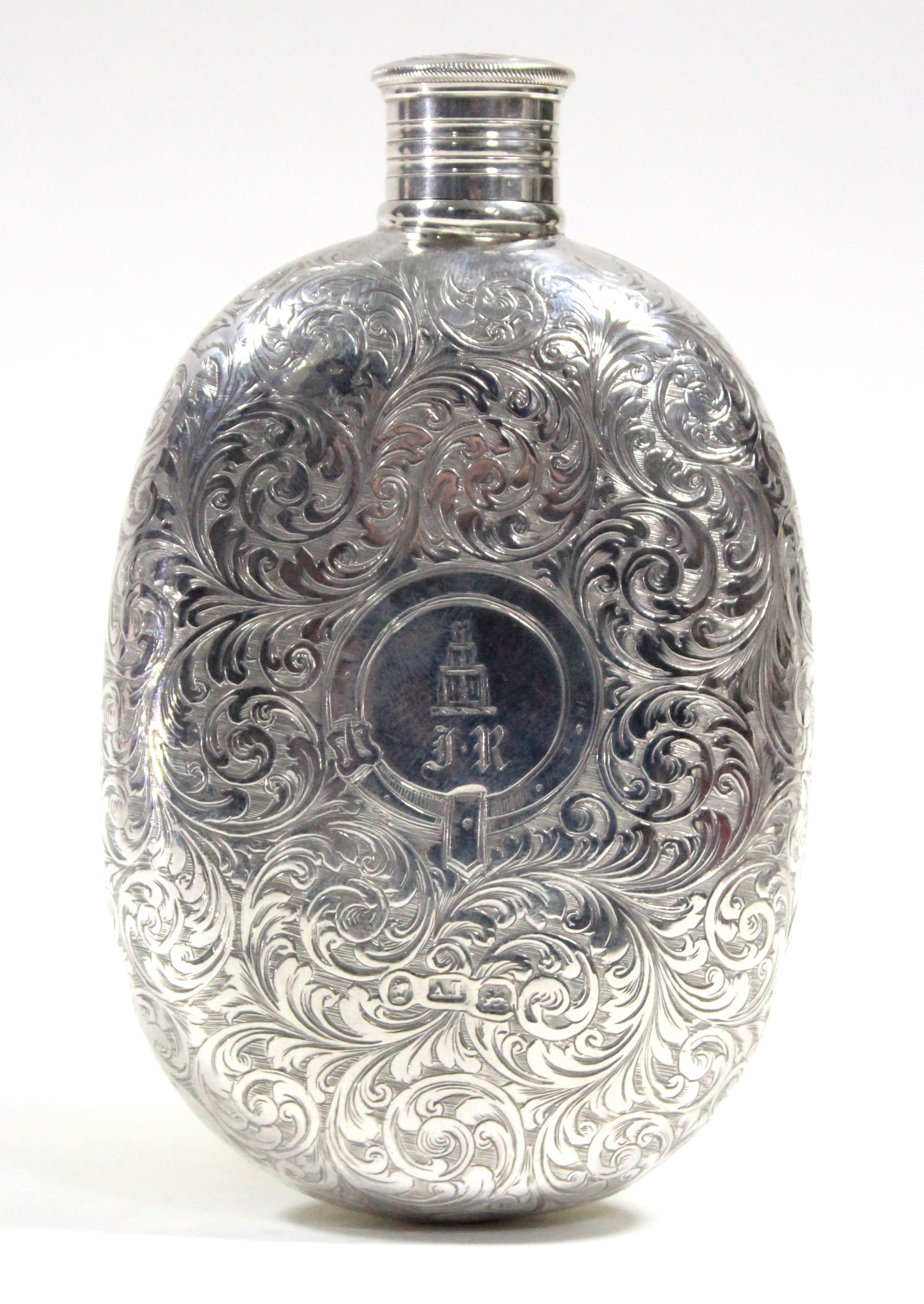 A Victorian silver oval flat-sided pocket spirit flask with all-over engraved decoration of leaf-