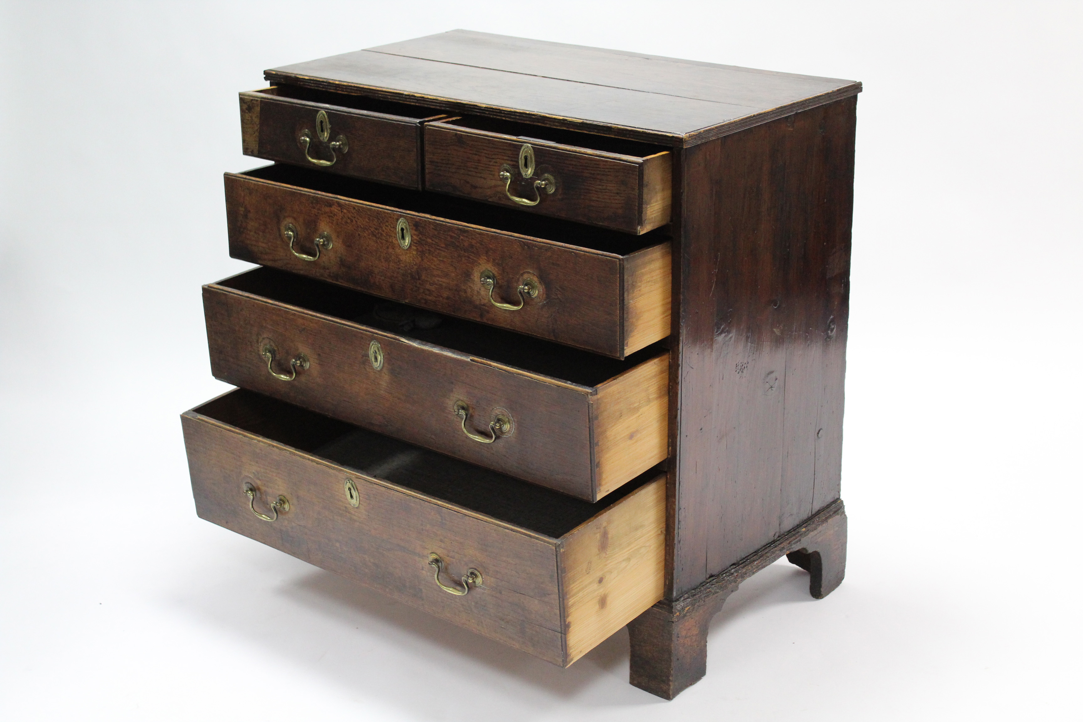 A late 18th century oak chest, fitted two short & three long graduated drawers with brass swan- - Image 2 of 2