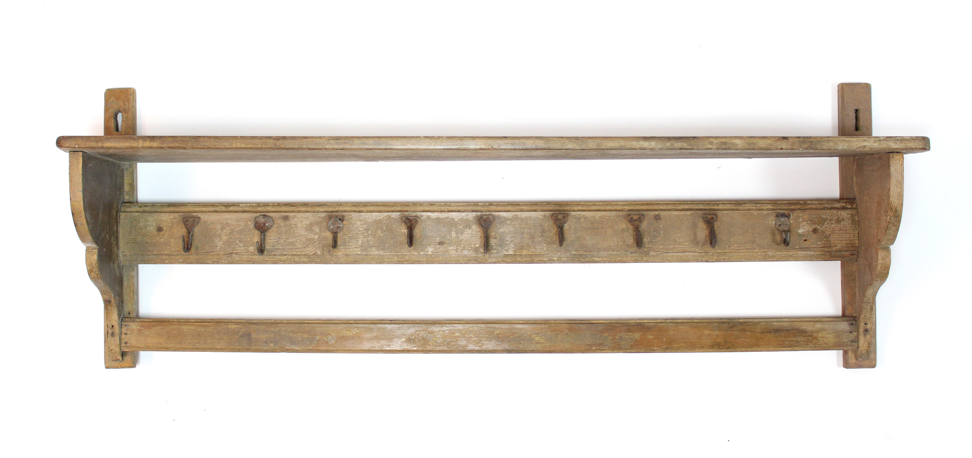 A Victorian painted pine kitchen wall shelf with hanging rack below, having nine wrought iron hooks;