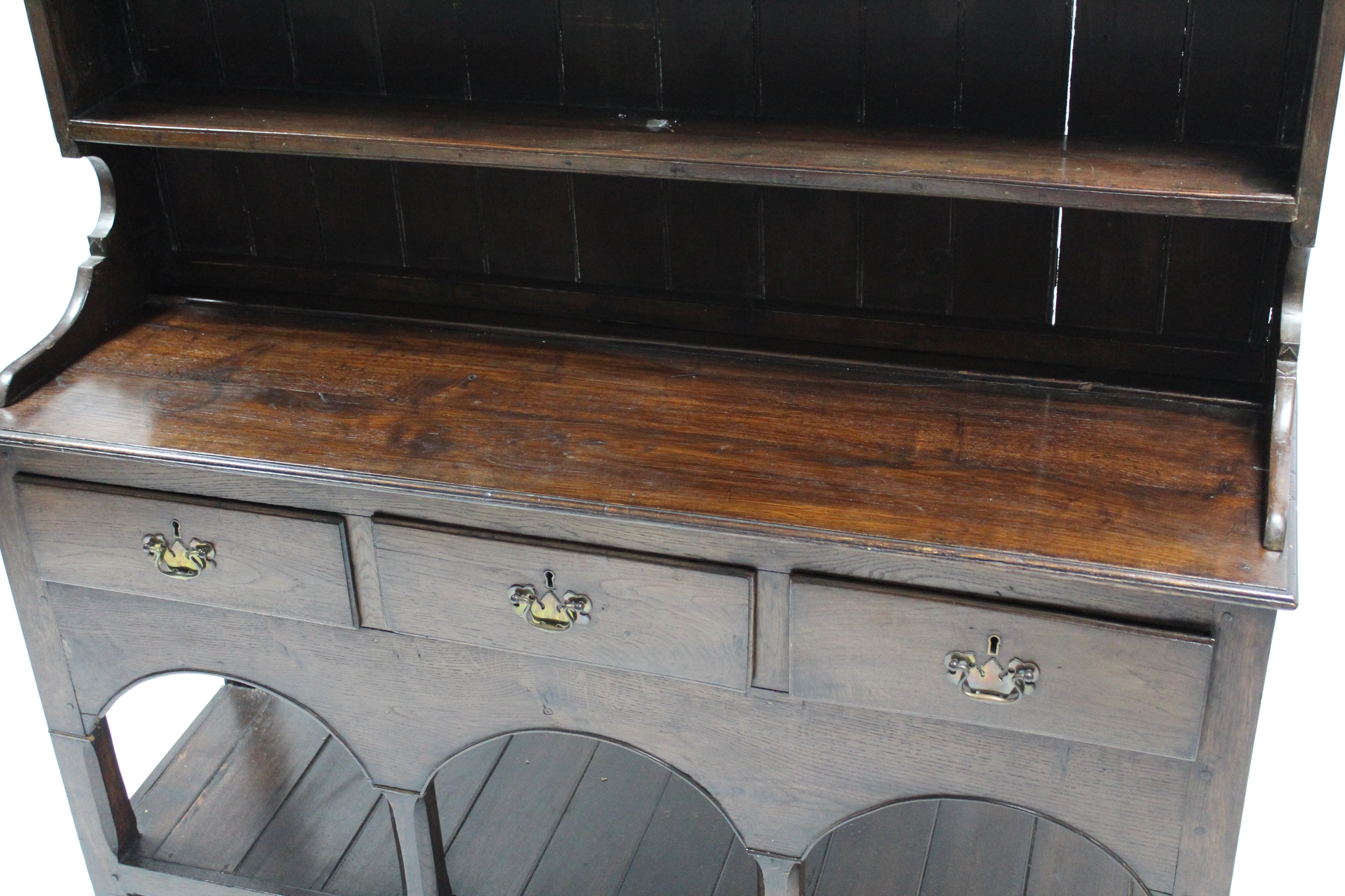 AN 18th century OAK DRESSER, fitted three shelves above three frieze drawers with shaped brass swing - Image 3 of 4