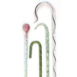 A Victorian glass spiral-twist walking cane filled with tiny multi-coloured beads, 43¼” long; a