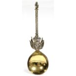 A Russian silver-gilt spoon with fig-shaped bowl, the cast spiral-twist stem with crowned mask,