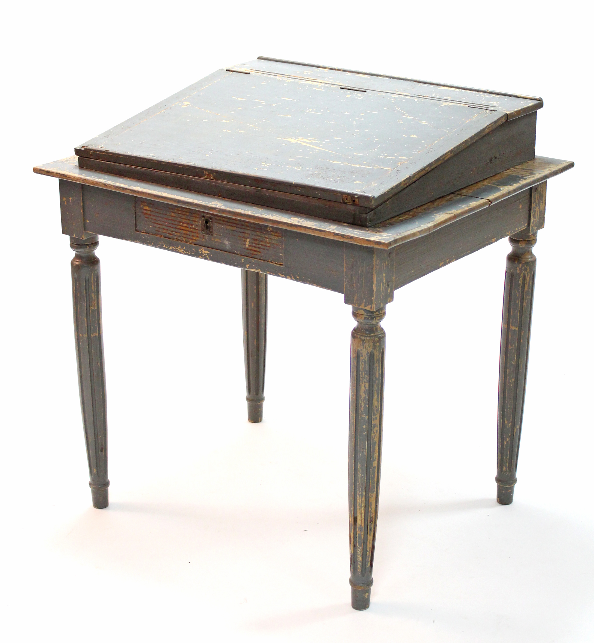 A 19th century painted pine desk with sloping hinged top, on turned & fluted tapering legs; 32”