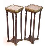 A pair of Louis XVI-style mahogany & brass-mounted lamp tables, each inset rouge marble top with