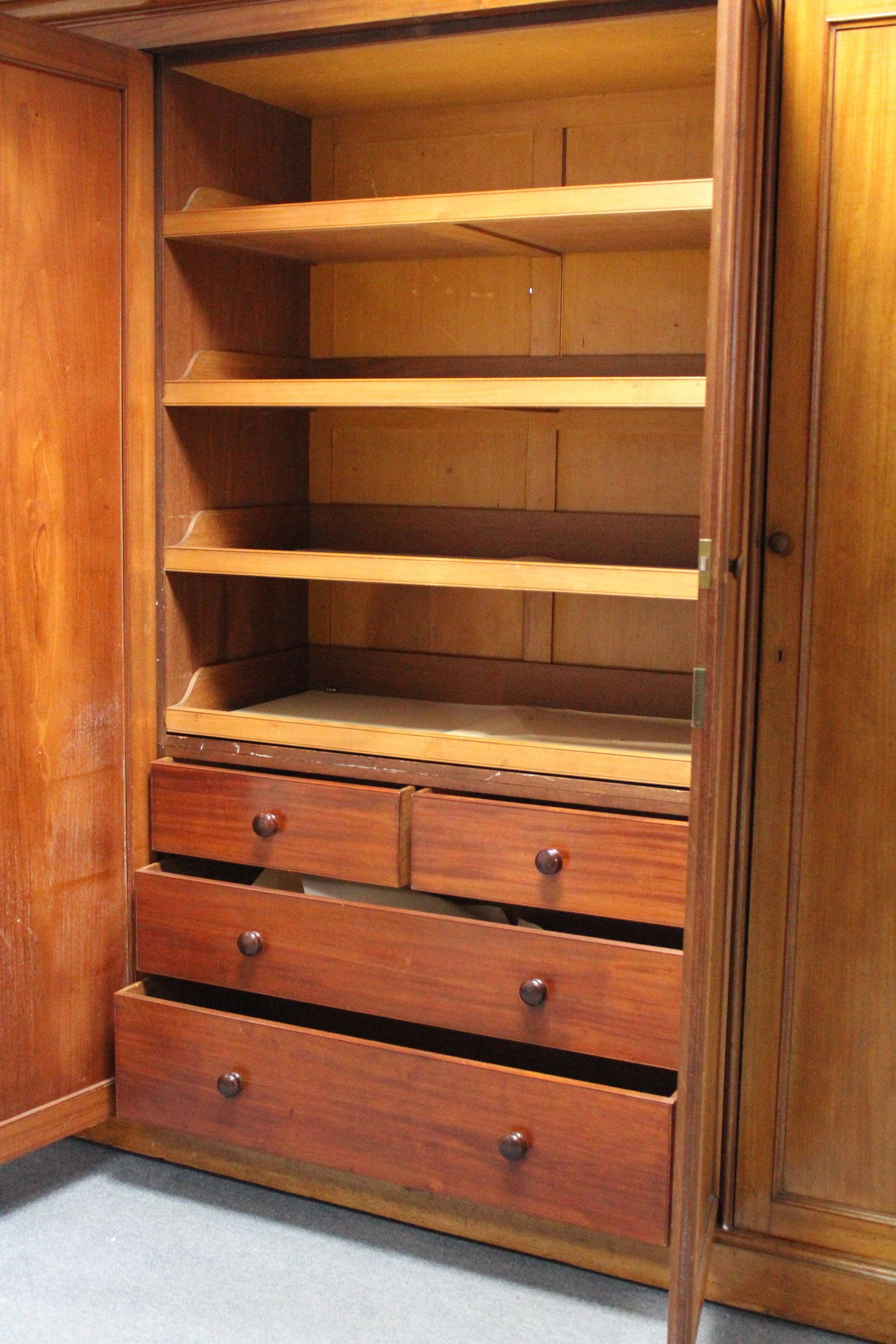 AN EARLY VICTORIAN MAHOGANY WARDROBE, the centre fitted four sliding trays above two short & two - Image 3 of 4