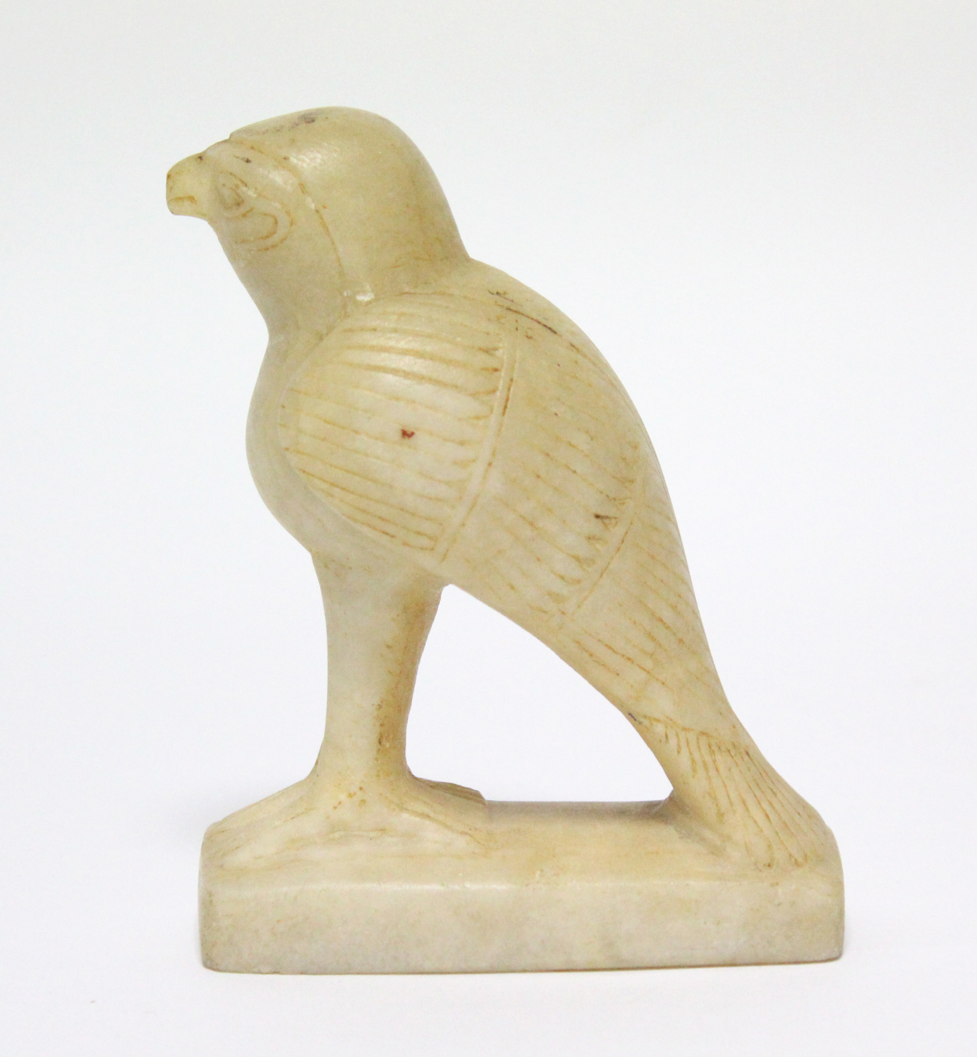 An Egyptian carved alabaster figure of Horus, on narrow rectangular base; 5” high. (Damage to - Image 3 of 5