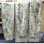 THREE PAIRS OF CREAM-GROUND CREWEL-WORK CURTAINS, with multi-coloured floral design, lined &