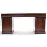 An early Victorian mahogany pedestal sideboard, fitted three frieze drawers to the plain rectangular