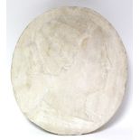 A sculptured white marble oval plaque depicting a renaissance-style female profile in low relief;