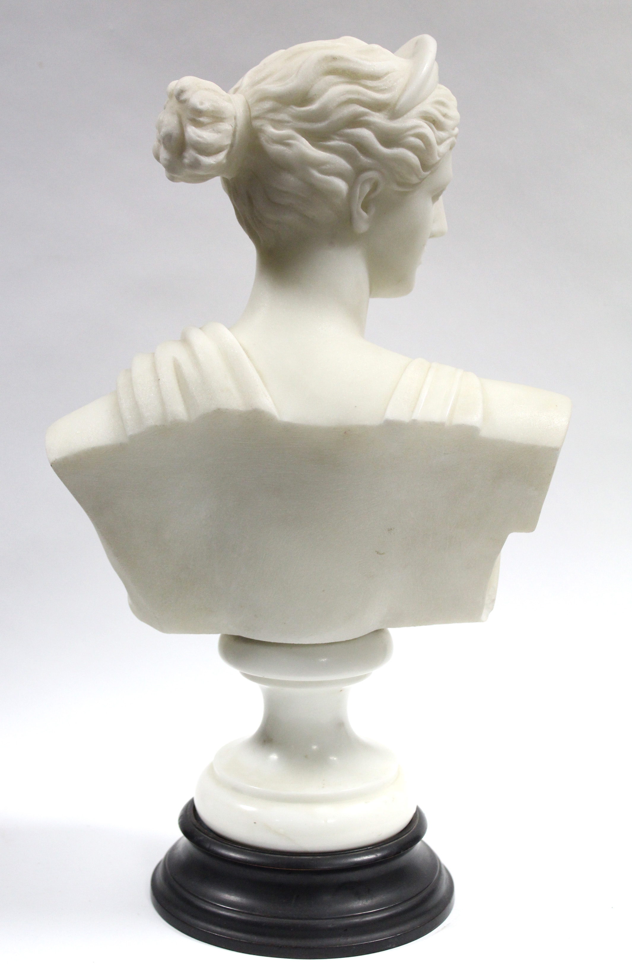 A late 19th century white marble classical female bust, on turned socle; 17” high. - Image 3 of 3