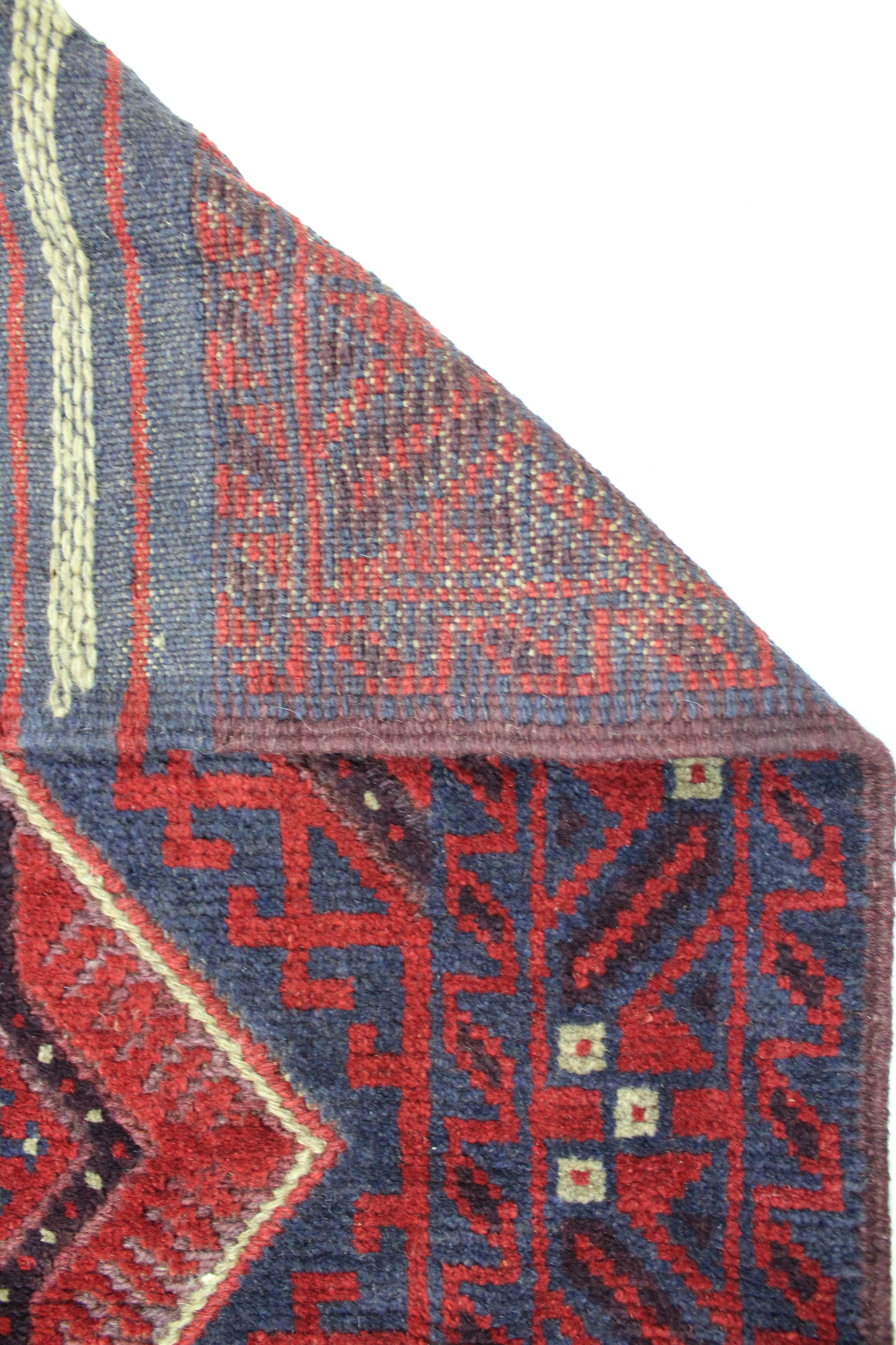 A Meshwari runner of crimson, blue, & ivory ground, with row of five lozenges within geometric - Image 2 of 2