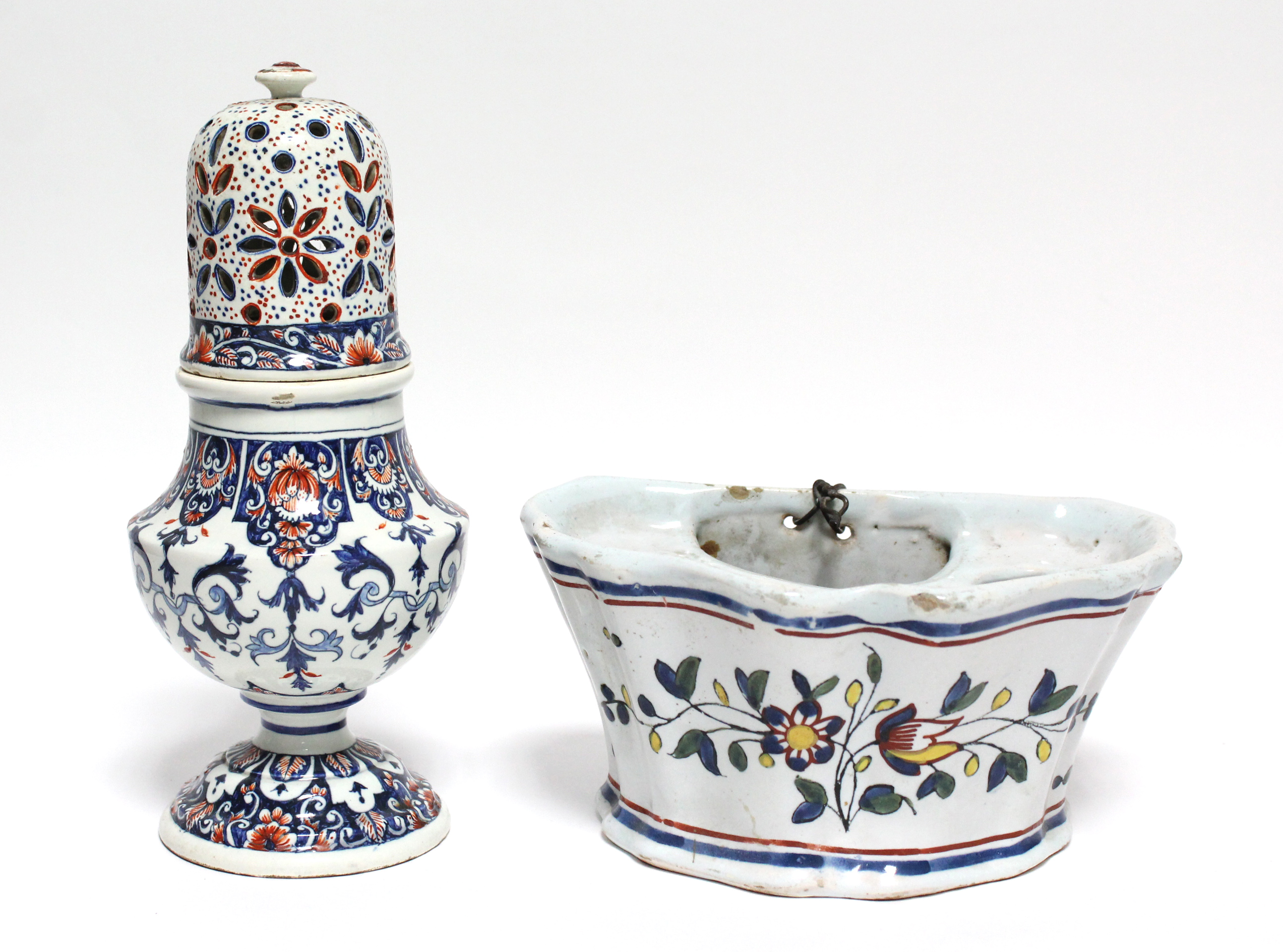 An 18th century Dutch polychrome delft large baluster-shaped sugar caster with tall domed screw-